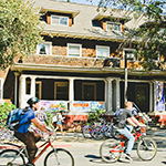 "students biking around campus at uc davis"