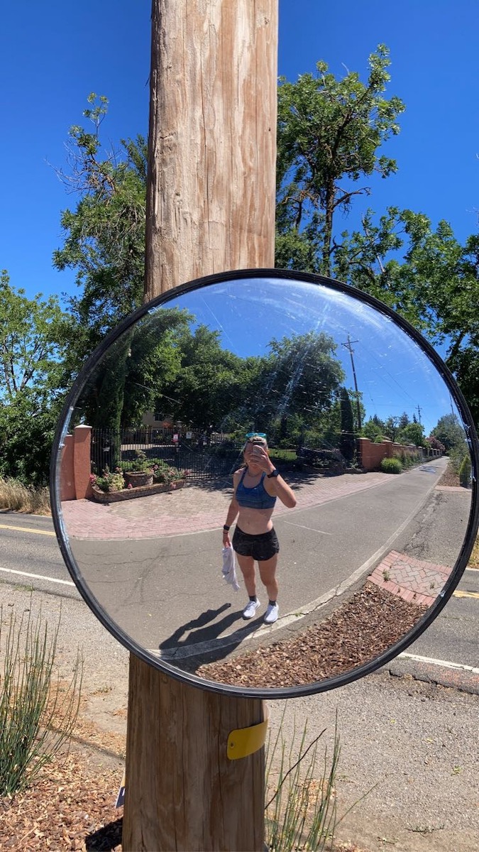 Selfie in a traffic mirror